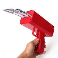 **Distractie garantata: Jucarie pistol de aruncat bani