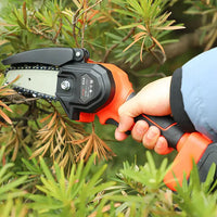 WOW: LICHIDARE STOC: Mini Fierastrau Electric Cu Acumulatori 24V, 2x Baterie + 2x Lant + 2x Lama, 4 Inch + CADOU pila 25cm+CADOU Cutie De Depozitare