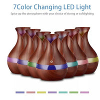 NOU: Difuzor de aromaterapie cu umidificator, led 7 culori + set 12 esente cu arome
